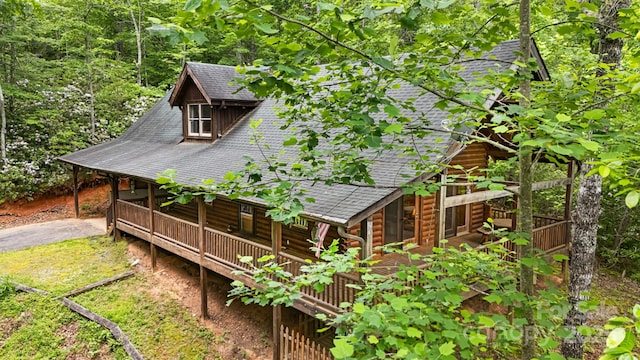 108 Cougar Aly Unit 79, Lake Lure, NC 28746 - back of property featuring roof with shingles and a wooden deck