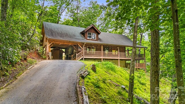 108 Cougar Aly Unit 79, Lake Lure, NC 28746 - log-style house featuring log exterior and asphalt driveway