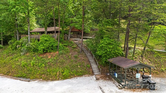 108 Cougar Aly Unit 79, Lake Lure, NC 28746 - view of yard featuring stairway and a forest view