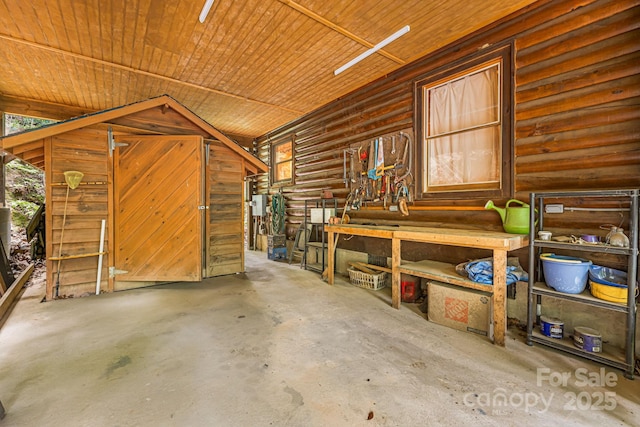 108 Cougar Aly Unit 79, Lake Lure, NC 28746 - garage featuring wood ceiling