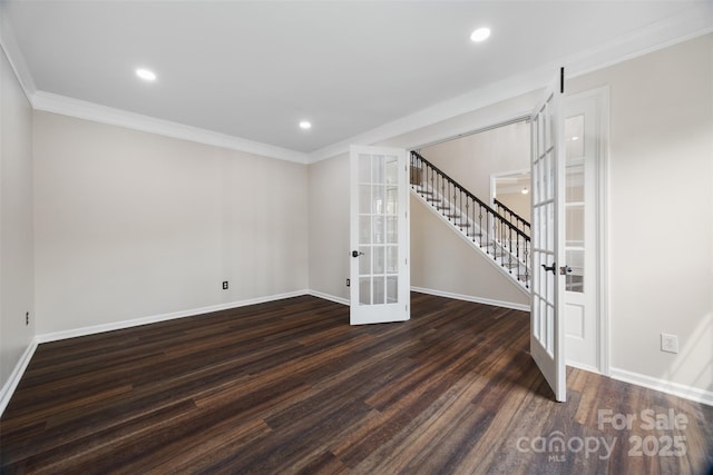 basement with french doors, wood finished floors, crown molding, baseboards, and stairs