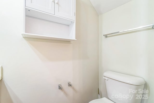 half bathroom with toilet