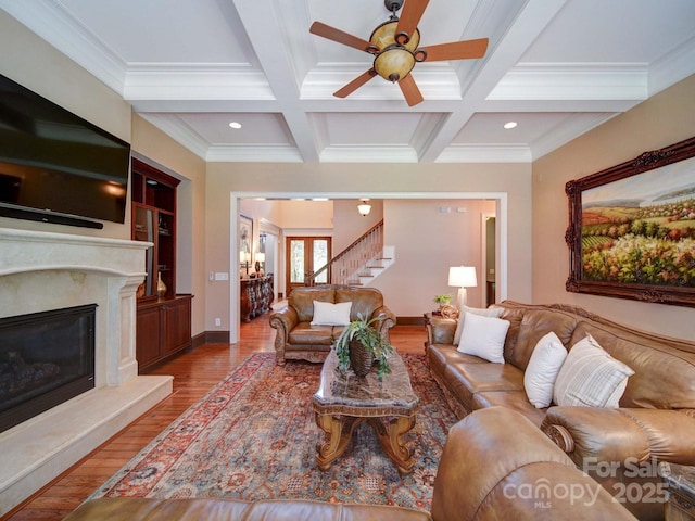 200 Waterby Way, Matthews, NC 28104 - living area with stairs, beam ceiling, ceiling fan, a premium fireplace, and recessed lighting