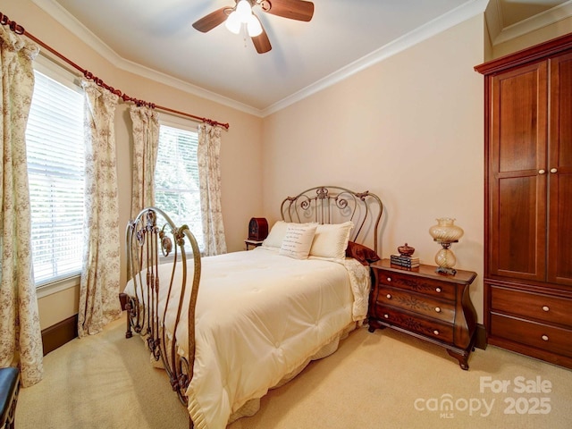 200 Waterby Way, Matthews, NC 28104 - bedroom with light colored carpet, crown molding, baseboards, and a ceiling fan
