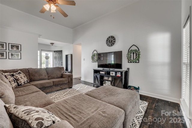 1140 Landsdown Dr, Salisbury, NC 28147 - living room featuring ceiling fan, a high ceiling, baseboards, dark wood-style floors, and crown molding