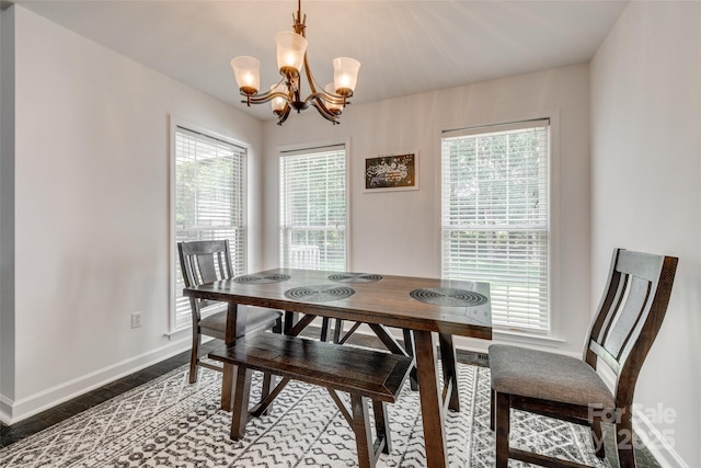 1140 Landsdown Dr, Salisbury, NC 28147 - dining space with a chandelier, baseboards, and dark wood-style floors