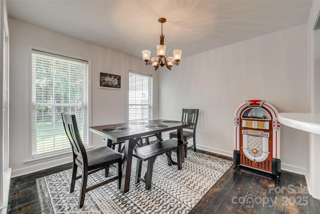 1140 Landsdown Dr, Salisbury, NC 28147 - dining space with a chandelier, hardwood / wood-style floors, and baseboards