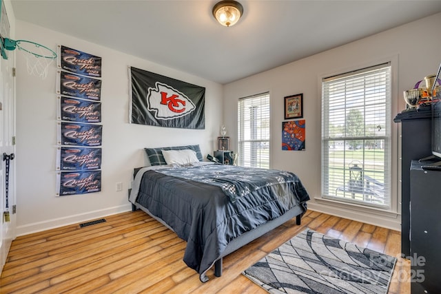 1140 Landsdown Dr, Salisbury, NC 28147 - bedroom with wood finished floors and baseboards
