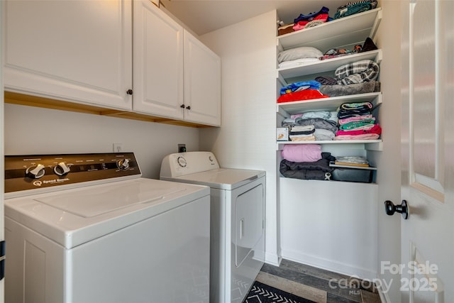 1140 Landsdown Dr, Salisbury, NC 28147 - clothes washing area with independent washer and dryer, cabinet space, and wood finished floors