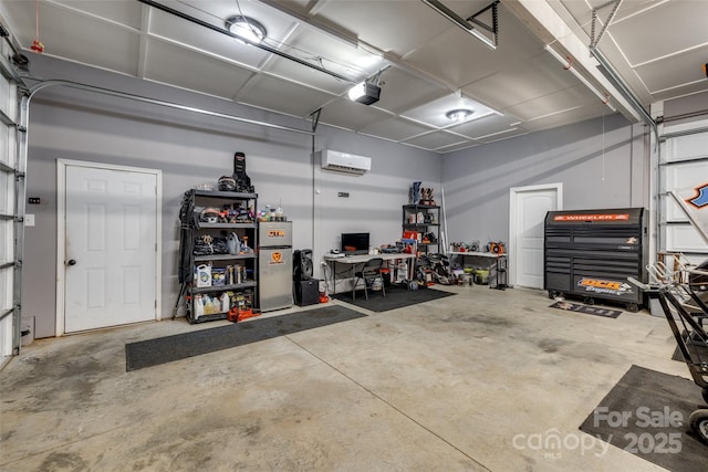 1140 Landsdown Dr, Salisbury, NC 28147 - garage with a garage door opener, a wall mounted air conditioner, and freestanding refrigerator