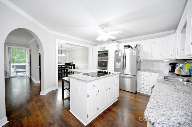1821 Sherrer Rd, York, SC 29745 - kitchen with stainless steel appliances, a sink, a kitchen island, backsplash, and a ceiling fan