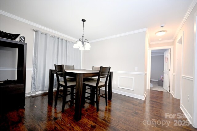 1821 Sherrer Rd, York, SC 29745 - dining area featuring a chandelier, wood finished floors, and ornamental molding