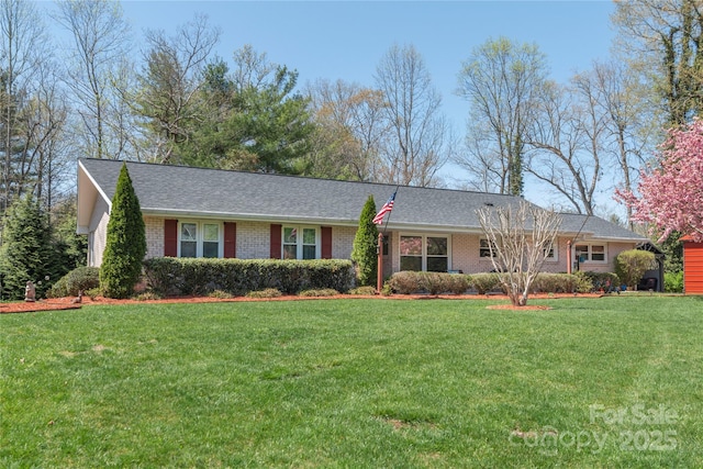 307 Tree Haven Blvd, Hendersonville, NC 28791 - single story home with brick siding and a front yard