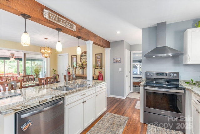 307 Tree Haven Blvd, Hendersonville, NC 28791 - kitchen featuring wall chimney exhaust hood, stainless steel appliances, a sink, dark wood-style floors, and white cabinetry