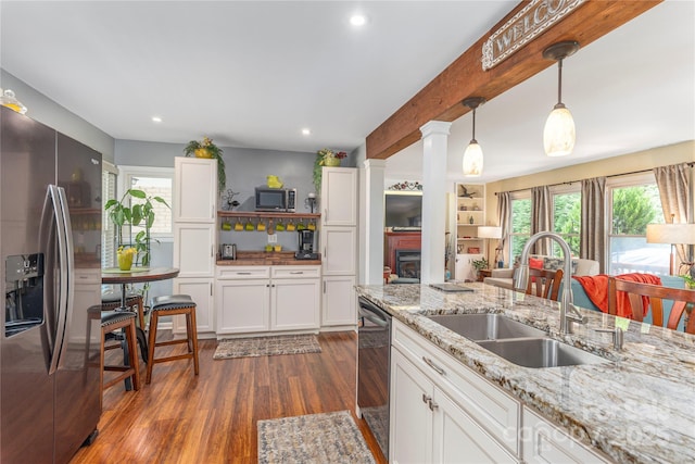 307 Tree Haven Blvd, Hendersonville, NC 28791 - kitchen with appliances with stainless steel finishes, a sink, dark wood-style flooring, plenty of natural light, and recessed lighting