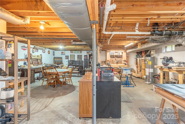 307 Tree Haven Blvd, Hendersonville, NC 28791 - below grade area with water heater and a workshop area