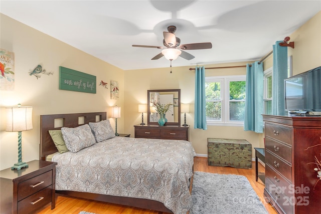 307 Tree Haven Blvd, Hendersonville, NC 28791 - bedroom featuring wood finished floors and a ceiling fan