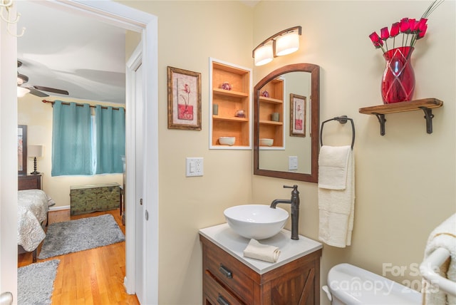 307 Tree Haven Blvd, Hendersonville, NC 28791 - ensuite bathroom with wood finished floors, ceiling fan, vanity, and toilet