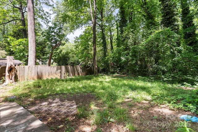 view of yard with fence