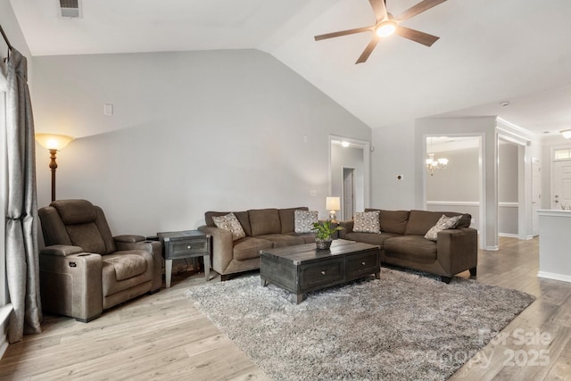 3820 Leela Palace Way, Fort Mill, SC 29708 - living area featuring a chandelier, a ceiling fan, light wood-style flooring, high vaulted ceiling, and baseboards