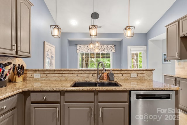 3820 Leela Palace Way, Fort Mill, SC 29708 - kitchen with dishwasher, a sink, decorative backsplash, light stone countertops, and vaulted ceiling