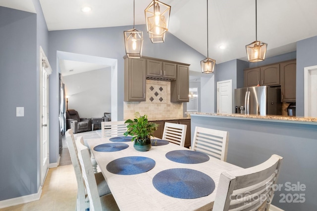 3820 Leela Palace Way, Fort Mill, SC 29708 - dining area featuring high vaulted ceiling, light tile patterned floors, and baseboards