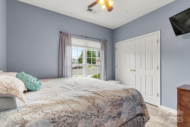 3820 Leela Palace Way, Fort Mill, SC 29708 - bedroom featuring wood finished floors, ceiling fan, baseboards, and a closet