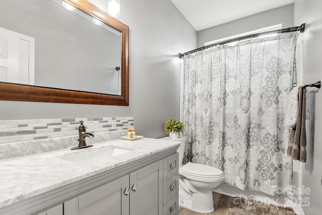 3820 Leela Palace Way, Fort Mill, SC 29708 - bathroom with wood finished floors, backsplash, vanity, toilet, and shower / tub combo
