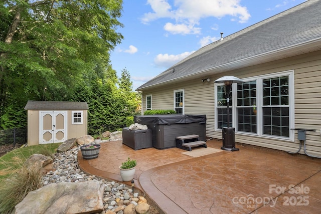 3820 Leela Palace Way, Fort Mill, SC 29708 - view of patio featuring a hot tub, a shed, an outbuilding, and fence
