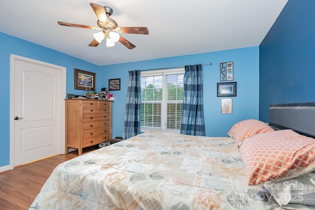 1221 Woodpecker Dr, Clover, SC 29710 - bedroom featuring wood finished floors and ceiling fan