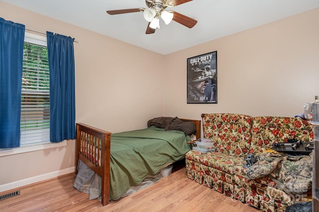 1221 Woodpecker Dr, Clover, SC 29710 - bedroom featuring wood finished floors, baseboards, and a ceiling fan