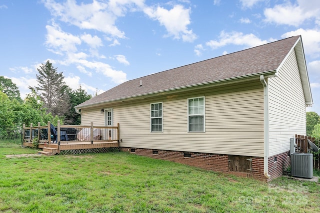 1221 Woodpecker Dr, Clover, SC 29710 - back of house featuring crawl space, central air condition unit, a lawn, a wooden deck, and a shingled roof