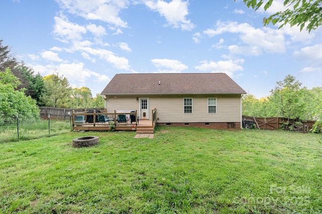 1221 Woodpecker Dr, Clover, SC 29710 - back of property featuring a fire pit, a deck, and crawl space