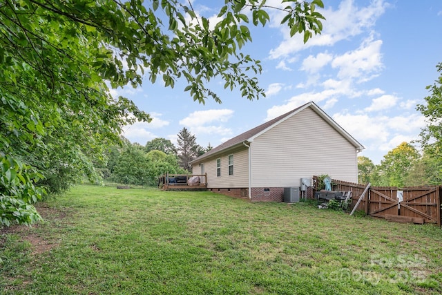 1221 Woodpecker Dr, Clover, SC 29710 - view of yard with a deck, a gate, and central AC