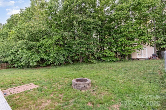 1221 Woodpecker Dr, Clover, SC 29710 - view of yard featuring a fire pit