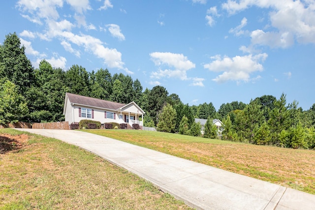 1221 Woodpecker Dr, Clover, SC 29710 - ranch-style house with concrete driveway and a wooded view