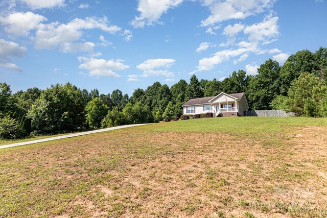 1221 Woodpecker Dr, Clover, SC 29710 - view of yard featuring a wooded view