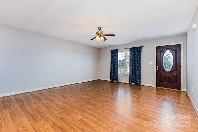 1221 Woodpecker Dr, Clover, SC 29710 - entrance foyer with ceiling fan and light wood finished floors
