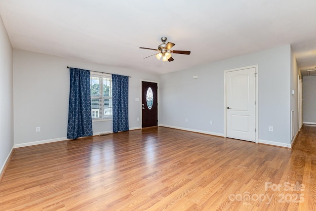 1221 Woodpecker Dr, Clover, SC 29710 - unfurnished living room with ceiling fan and light wood-style floors