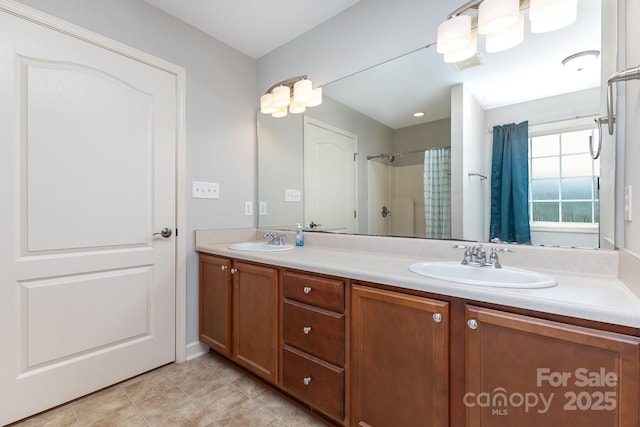 1221 Woodpecker Dr, Clover, SC 29710 - bathroom with double vanity, a shower with curtain, and tile patterned flooring