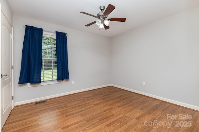 1221 Woodpecker Dr, Clover, SC 29710 - spare room with light wood-style flooring and ceiling fan