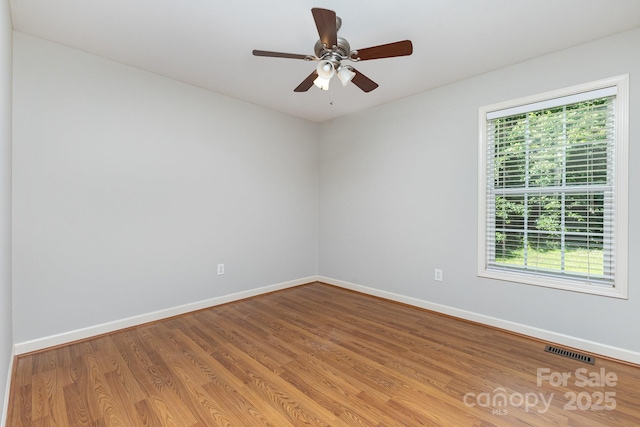 1221 Woodpecker Dr, Clover, SC 29710 - spare room with light wood-style flooring and a ceiling fan