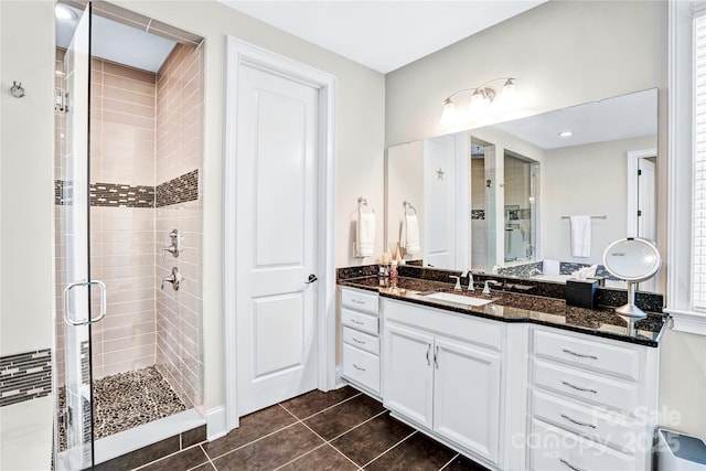 13204 Feale Ct, Charlotte, NC 28278 - bathroom with a stall shower, tile patterned floors, and vanity