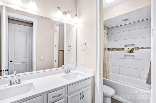 13204 Feale Ct, Charlotte, NC 28278 - full bath featuring toilet, double vanity, and shower / bath combo with shower curtain