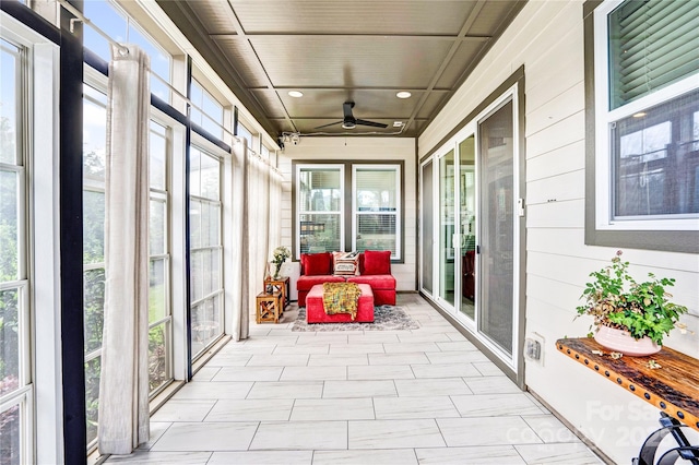 13204 Feale Ct, Charlotte, NC 28278 - sunroom featuring ceiling fan, healthy amount of natural light, wooden walls, and recessed lighting