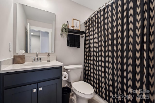 full bathroom with toilet, vanity, and a shower with shower curtain
