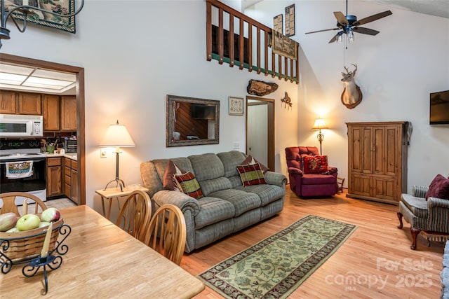 5 Creekside Dr, Maggie Valley, NC 28751 - living room with a ceiling fan, high vaulted ceiling, and light wood finished floors
