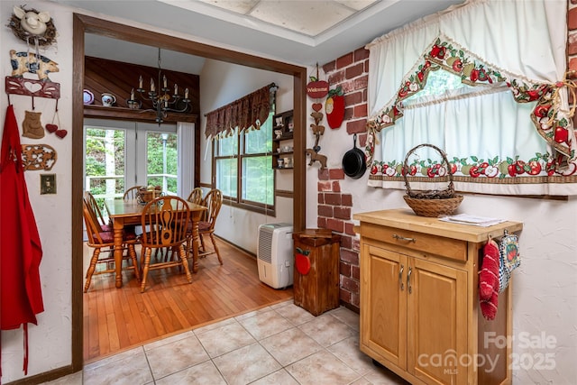5 Creekside Dr, Maggie Valley, NC 28751 - dining space featuring a chandelier and light tile patterned floors