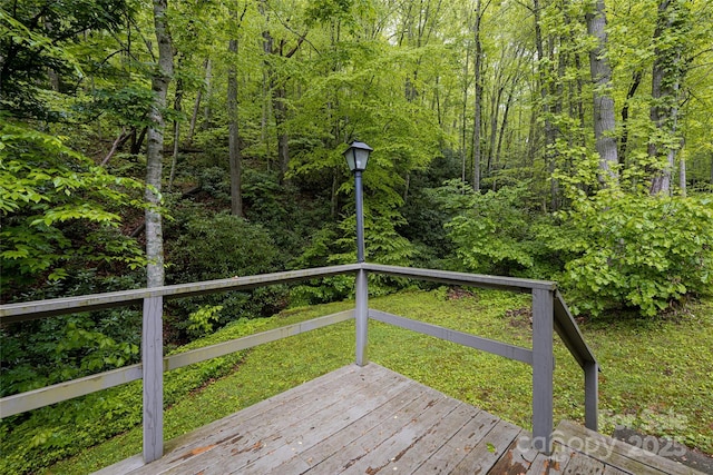 5 Creekside Dr, Maggie Valley, NC 28751 - wooden deck with a wooded view