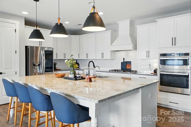 2062 Nellies Way, Fort Mill, SC 29715 - kitchen featuring stainless steel appliances, custom range hood, a sink, backsplash, and recessed lighting